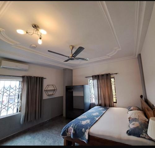 Katil atau katil-katil dalam bilik di BAFFOUR APARTMENTS