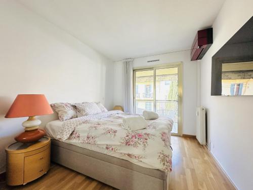 Posteľ alebo postele v izbe v ubytovaní Cannes Center - Appartement 2 pièces avec terrasse