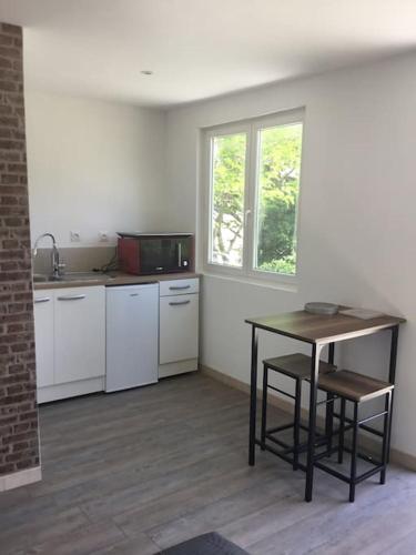 Kuchyň nebo kuchyňský kout v ubytování chalet 19m2 pour 2 personnes