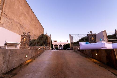 an empty street in front of a building at Vista Mare by DomuSicily in Cinisi