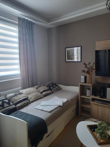 Postel nebo postele na pokoji v ubytování Regina S
