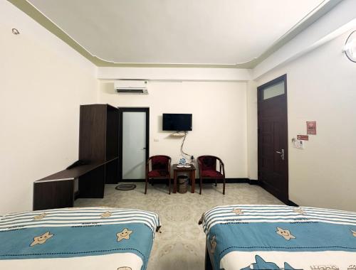 Ha Giang Ali Hostelにあるベッド
