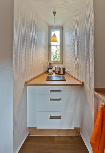 Dapur atau dapur kecil di Ferienwohnung im Weberturm Goslar