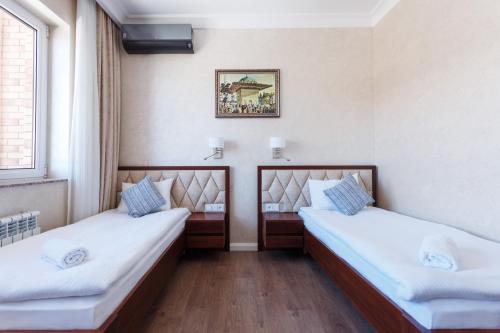 Ένα ή περισσότερα κρεβάτια σε δωμάτιο στο Panoramic Spa Hotel