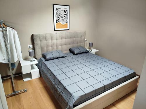 Giường trong phòng chung tại Casa Fedra, delizioso loft frontelago