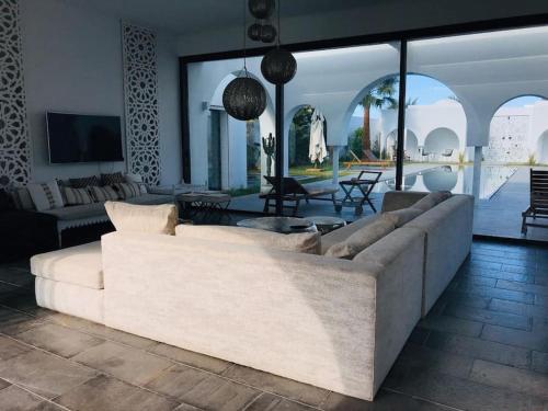 Μια τηλεόραση ή/και κέντρο ψυχαγωγίας στο DAR OULED SOLTANE, havre de paix à Gammarth