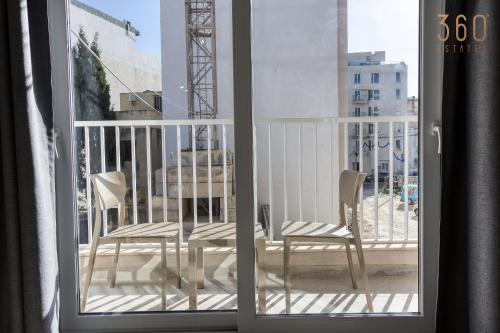 Balcon ou terrasse dans l'établissement Urban Square Elite Suites by 360 Estates