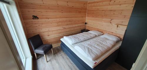 Postel nebo postele na pokoji v ubytování Ferienhaus Trollebo