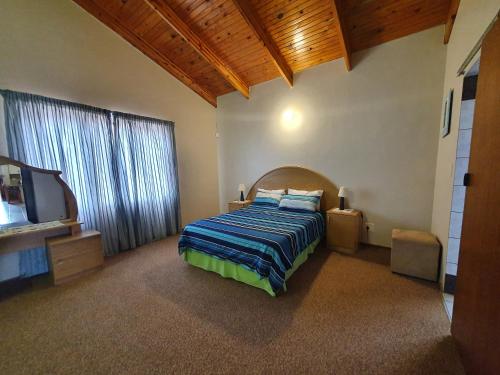 Katil atau katil-katil dalam bilik di House Roos and Flat