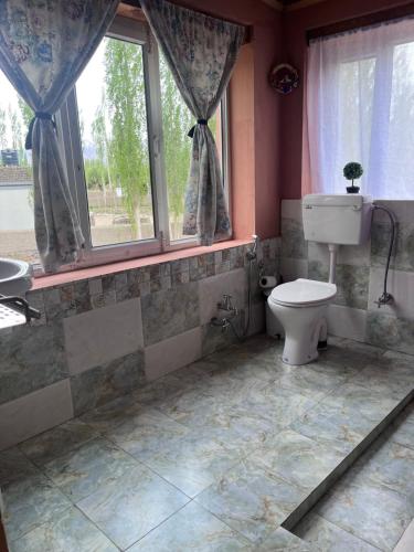 Koupelna v ubytování Trinity Home Stay