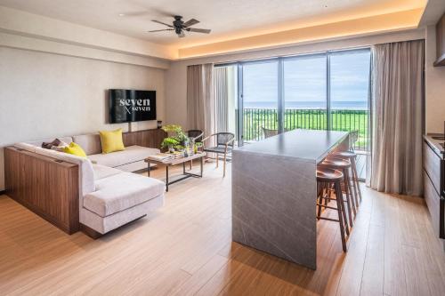 Una cama o camas en una habitación de seven x seven ISHIGAKI