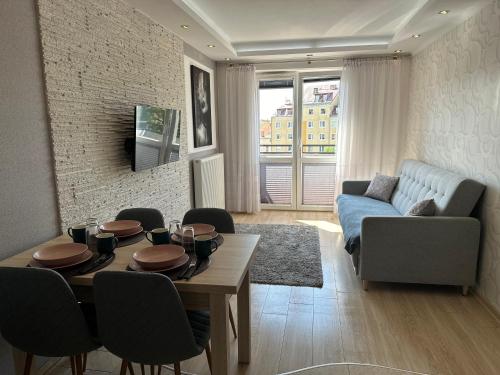 Μια τηλεόραση ή/και κέντρο ψυχαγωγίας στο Apartament Sole