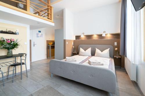 Katil atau katil-katil dalam bilik di Apartments am Schlosspark