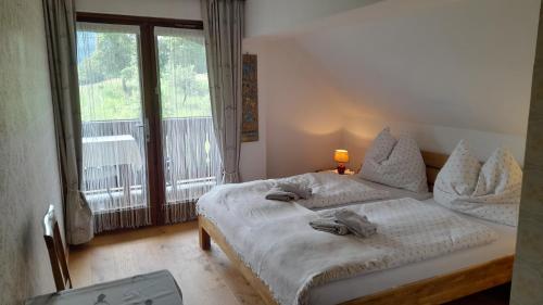 A bed or beds in a room at Ferienwohnung Johanna
