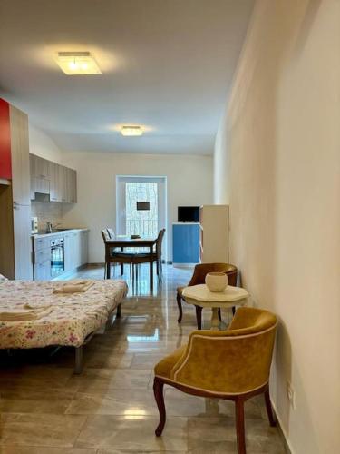 Postel nebo postele na pokoji v ubytování Loft in Fiera