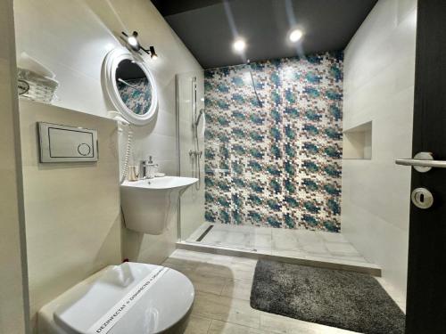 Et badeværelse på ApartHotel Resort Sud B