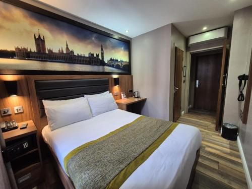 Katil atau katil-katil dalam bilik di London Court Hotel