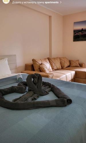 Postel nebo postele na pokoji v ubytování Apartmani Porta Infinitas