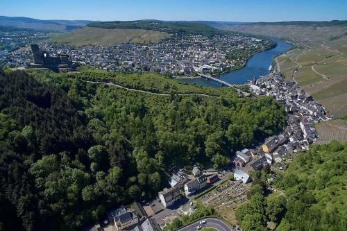 an aerial view of a town next to a river at Ferienhaus mit Whirlpool und Sauna in Bernkastel-Kues