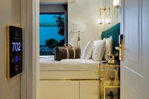 Un ou plusieurs lits dans un hébergement de l'établissement Mitspark Hotel
