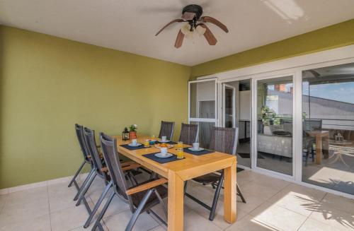a dining room with a table and chairs at Apartment Oliver in Soline