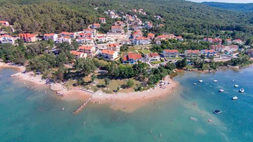 an aerial view of a resort on a beach at Apartment Oliver in Soline
