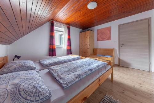 Ένα ή περισσότερα κρεβάτια σε δωμάτιο στο Apartments Bor