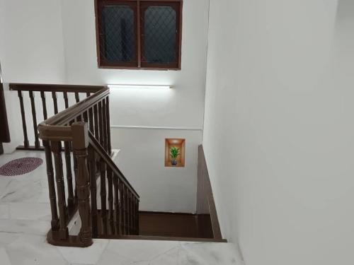 Postel nebo postele na pokoji v ubytování Sunlight Homestay