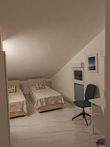 Ένα ή περισσότερα κρεβάτια σε δωμάτιο στο Casa Marco Aurelio al Mare