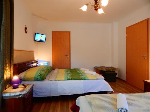 Postel nebo postele na pokoji v ubytování Ocean apartman