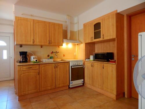 Kuchyň nebo kuchyňský kout v ubytování Ocean apartman
