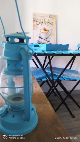 a blue machine sitting on top of a table at Kuća za odmor Zdravac in Kragujevac