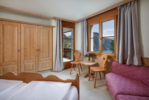 Letto o letti in una camera di Hotel und Naturhaus Bellevue