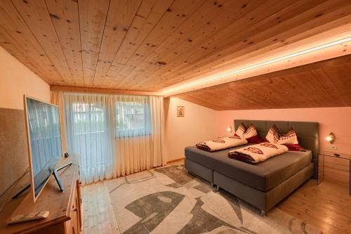Postel nebo postele na pokoji v ubytování Ferienhaus Konrad
