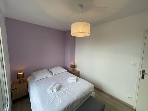 Ένα ή περισσότερα κρεβάτια σε δωμάτιο στο Persea YourHostHelper