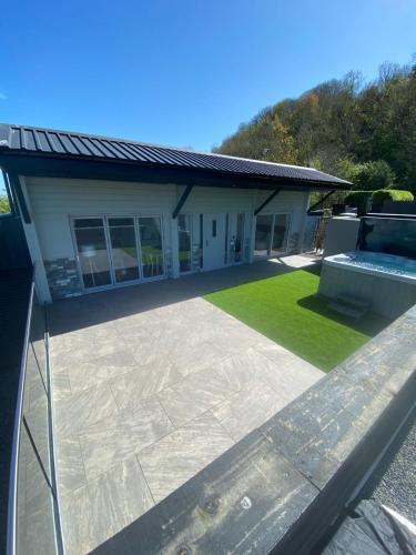 a view of a house with a patio at Channel View in Weston-super-Mare