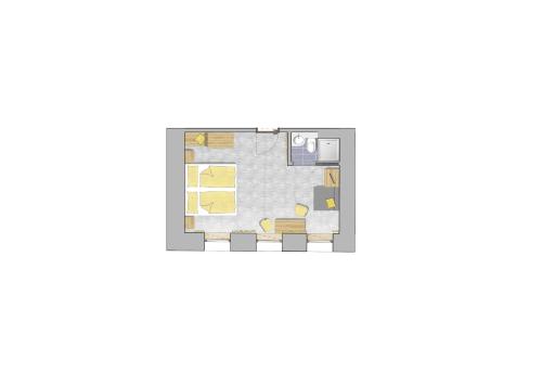 a floor plan of a bedroom with a fireplace at Hotel Zum Mohren in Reutte