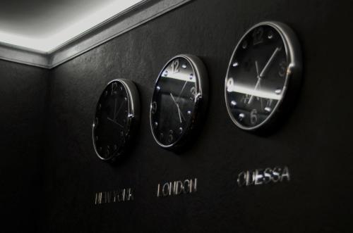 two clocks on the wall of a car at Levanevsky Hotel in Odesa