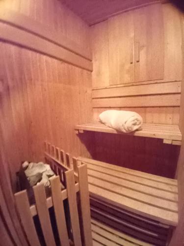 a sauna with a white towel sitting on top of it at Holiday Home Juričko with private Sauna in Bizeljsko