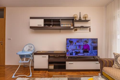 TV a/nebo společenská místnost v ubytování AZI Penthouse