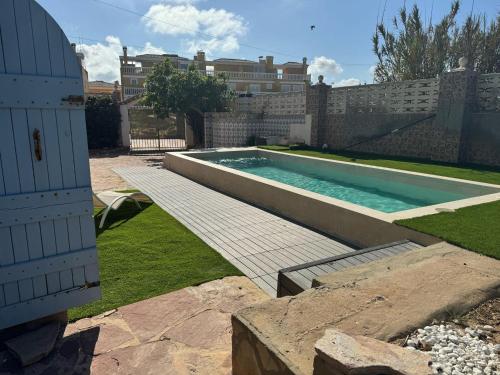 Πισίνα στο ή κοντά στο Oasis en la playa: piscina y relax