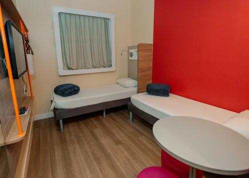 Katil atau katil-katil dalam bilik di IBIS BUDGET CAPAO Bonito