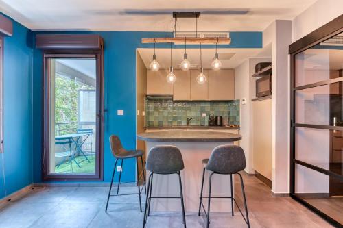 Η κουζίνα ή μικρή κουζίνα στο GuestReady - Lovely Getaway near Lyon