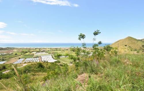 an aerial view of the ruins of the temple ofargonbourg with the ocean at Villa Al Monte in Mondragone
