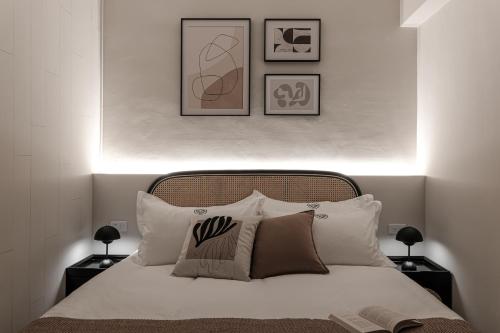 Ένα ή περισσότερα κρεβάτια σε δωμάτιο στο We2 Design Hotel