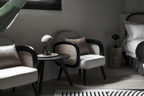 Ένα ή περισσότερα κρεβάτια σε δωμάτιο στο We2 Design Hotel