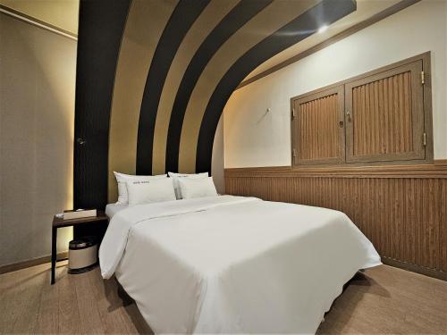 HOTEL ViAにあるベッド