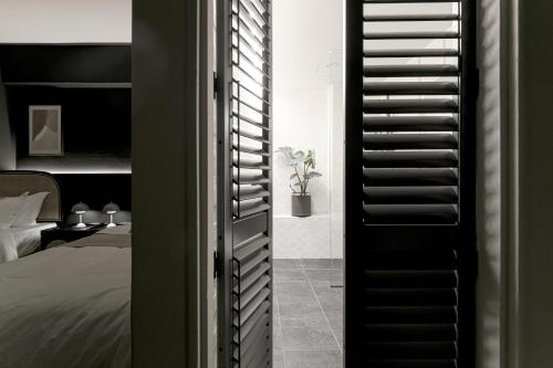 Ένα ή περισσότερα κρεβάτια σε δωμάτιο στο We2 Design Hotel