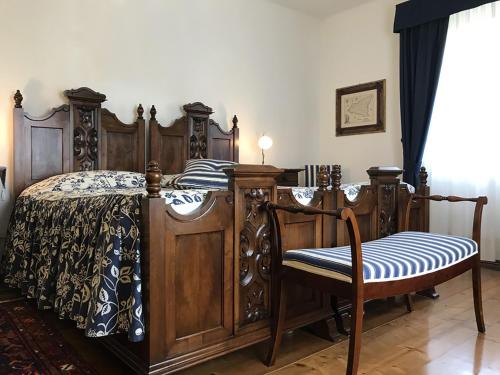 Postel nebo postele na pokoji v ubytování Casa Due Tigli B&B