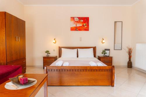 A bed or beds in a room at Apartments Vasileiou Suite 3
